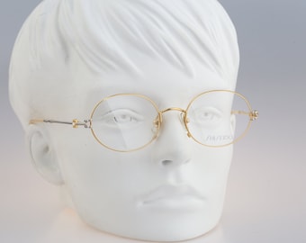 Shiseido 1010 3 Accessoires Zonnebrillen & Eyewear Brillen Vintage jaren '90 halve rand zilver ovale bril montuur dames NOS 