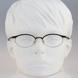 It&#39;s Titanium 604, Vintage 90s laser cut ultra lightweight nylor black oval cat eye glasses frames women / NOS