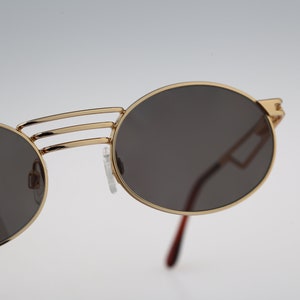 Florence Vogue 3155 S 280 25, Vintage 90s unique gold steampunk oval sunglasses mens & women, NOS