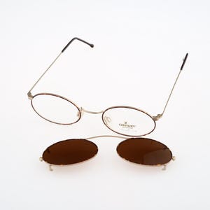 Century Eyewear av Neostyle 225 378, Vintage 90-tals solglasögon med sköldpaddsmönster och guldfärgade klämmor och små, runda glasögonbågar NOS