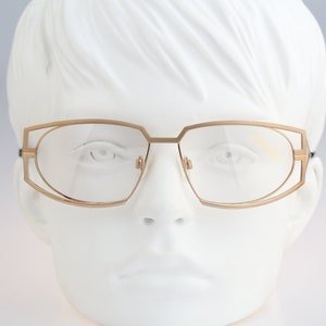 Silhouette M 6119, Vintage 90s gold futuristic oval eyeglasses frames mens & womens NOS