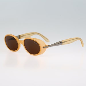 Round sunglasses with top side shields india