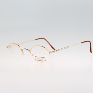 Vuillet Vega Prestige 360 32, montatura per occhiali ovale piccola con mezza montatura in argento e oro vintage anni &#39;90 da uomo e da donna NOS