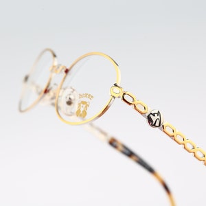 Boxer V 04 3955, Vintage 90s silver and gold small oval eyeglasses frames womens NOS