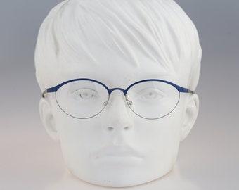 It's Titanium 605, Vintage 90s laser cut ultra lightweight nylor blue cat eye glasses frames women / NOS