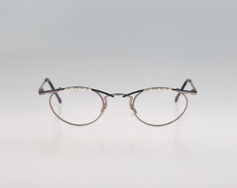 Puma di Licefa MP 719 584, montature per occhiali ovali piccole colorate uniche vintage anni '90 da donna NOS
