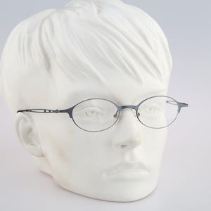 Eye Tec Viola 06, montatura per occhiali da vista ovali sottili blu tintec vintage anni &#39;90 da uomo e da donna NOS