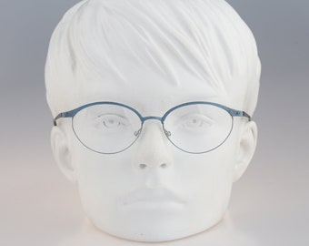 It's Titanium 605, Vintage 90s laser cut ultra lightweight nylor blue cat eye glasses frames women / NOS