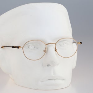 Apollo 18291, Vintage 90s gold and tortoise small round eyeglasses frames mens & womens NOS