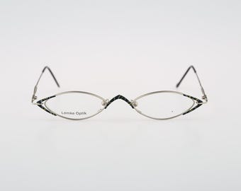 Think Caliente  543 71, Vintage 90s gray and green unique small oval eyeglasses frames womens NOS