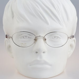 Shiseido SH 1063 2 Titanium , Vintage 90s unique silver small cat eye glasses frames womens NOS