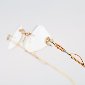 Zeitlos ZL B2 01, Vintage 90s crazy gold and colorful small oval eyeglasses rimless frames womens NOS
