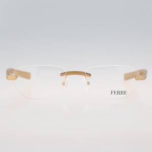 Gianfranco Ferre GF03904, Vintage 90s gold rimless oval eyeglasses frames womens NOS