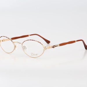 Diva 5129 E 72 E, Vintage 90s gold and tortoise genuine wood temples small oval glasses frames womens NOS