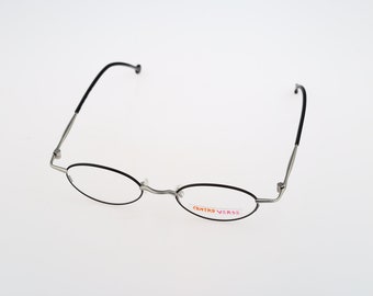 Contro Verse 4280 010 22, Vintage 90s unique black and silver oval eyeglasses frames mens & womens NOS