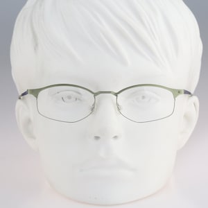 It&#39;s Titanium 602, Vintage 90s laser cut ultra lightweight nylor green small rectangle glasses frames women / NOS