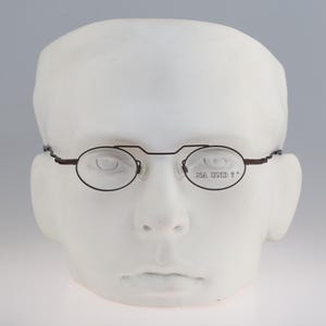 Na Und design Marion Ramm 82F2125A, Vintage 90s bronze micro small oval reading glasses frames mens & womens NOS
