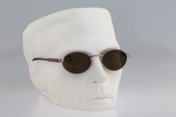 サングラス Benetton Sunglasses BE7038 813 Overfit Silver l Frame 7038 sunglasses | SmartBuyGlasses Singapore