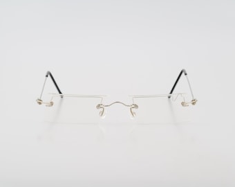Tom's 139, Vintage 90s unique silver rimless small rectangle glasses frames womens NOS