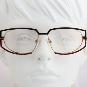 Silhouette M 6119, Vintage 90s pink and purple futuristic oval eyeglasses frames mens & womens NOS