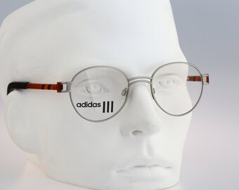 Adidas A702, Vintage 90s designer silver panto round eyeglasses frames mens & womens NOS