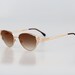 see more listings in the Cat Eye & Butterfly Sung section