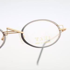 Taxi By Casanova ST 12 03, Vintage 90s gray and gold unique small oval eyeglasses frames mens & womens NOS