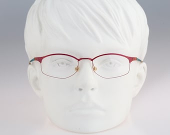 It's Titanium 602, Vintage 90s laser cut ultra lightweight nylor pink small rectangle glasses frames women / NOS