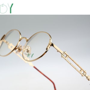 Joy Kazu, Vintage 90s designer steampunk gold oval eyeglasses frames mens & womens NOS