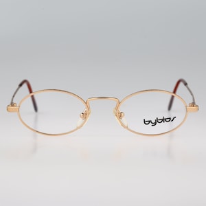 Byblos 606 6001, Vintage 90s gold small slim oval eyeglasses frames mens & womens NOS