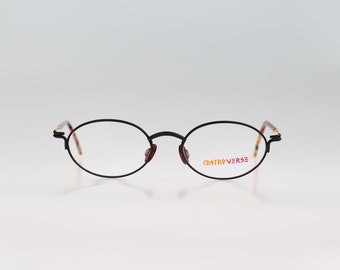 Contro Verse 3070 127 08, Monturas de gafas ovaladas vintage de los 90, únicas, coloridas y negras, para mujer, nuevas sin usar.