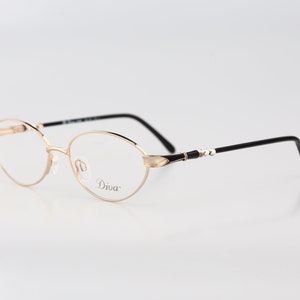 Diva 5146 2, Vintage 90s victorian gold oval eyeglasses frames womens NOS