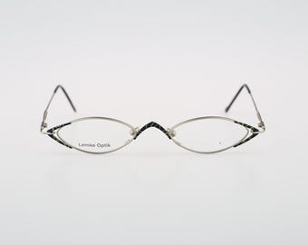 Think Caliente  543 71, Vintage 90s gray and green unique small oval eyeglasses frames womens NOS