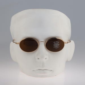 Vuarnet 066, Vintage 90er Jahre gehärtet Glas Linsen einzigartig Gold oval Sonnenbrille Herren & Damen NOS
