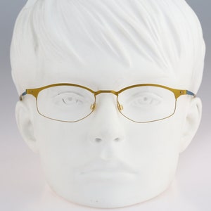 It&#39;s Titanium 602, Vintage 90s laser cut ultra lightweight nylor yellow small rectangle glasses frames women / NOS