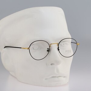 Bridge Club Avenue 03, Vintage 90s black and gold panto round eyeglasses frames mens & womens NOS