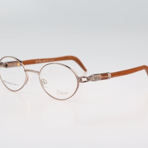 Diva 5095 120, Vintage 90s pink and genuine wood temples oval eyeglasses frames mens & womens NOS