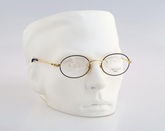 Deltaline 260, anteojos vintage de los años 90 con montura ovalada en dorado y negro, para hombre y mujer, NOS
