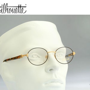 Silhouette M 6335 V 6055, Vintage 90s black and gold unique oval eyeglasses frames mens & womens NOS