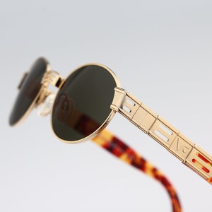 Florence Vogue 3191 S 280 25, Vintage 90s gold & tortoise unique small oval sunglasses men and women NOS