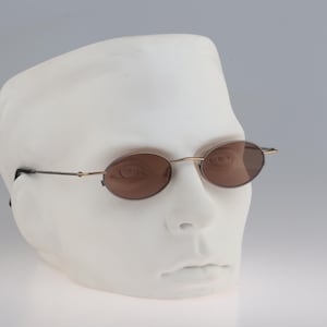 Robert Rudger 2172 010 27, Vintage 90s tinted lenses gray and gold steampunk small oval sunglasses mens & women, NOS