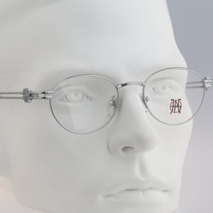 Jean Paul Gaultier 57-5102, Vintage 90s designer silver small round eyeglasses frames mens & womens NOS