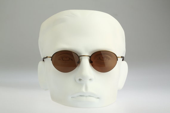Gafas redondas pequeñas hombre sale