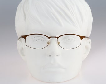 It's Titanium 602, Vintage 90s laser cut ultra lightweight nylor bronze small rectangle glasses frames women / NOS