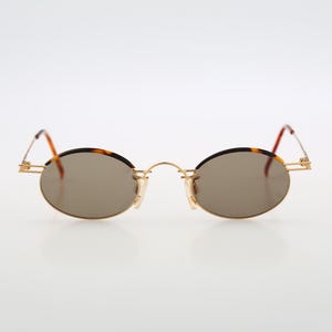 Taxi SM 53 02, Vintage 90s gold and tortoise browline small oval sunglasses mens & women, NOS