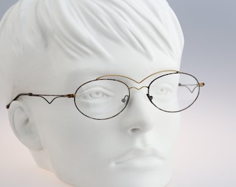 Prima N2, Vintage 90s unique crazy oval eyeglasses frames womens NOS
