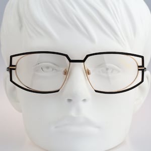 Silhouette M 6119, Vintage 90s black and gold futuristic oval eyeglasses frames mens & womens NOS