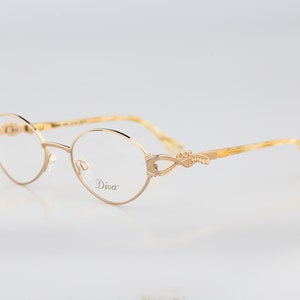 Diva 5058 6, Vintage 90s victorian gold oval eyeglasses frames womens NOS
