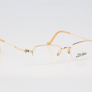 Jean Paul Gaultier 55-8109, Vintage 90s unique gold half rim small cat eye glasses frames womens NOS
