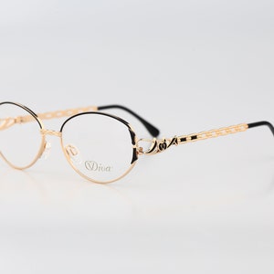 Diva 5049 11, Vintage 90s victorian gold and black browline oval eyeglasses frames womens NOS